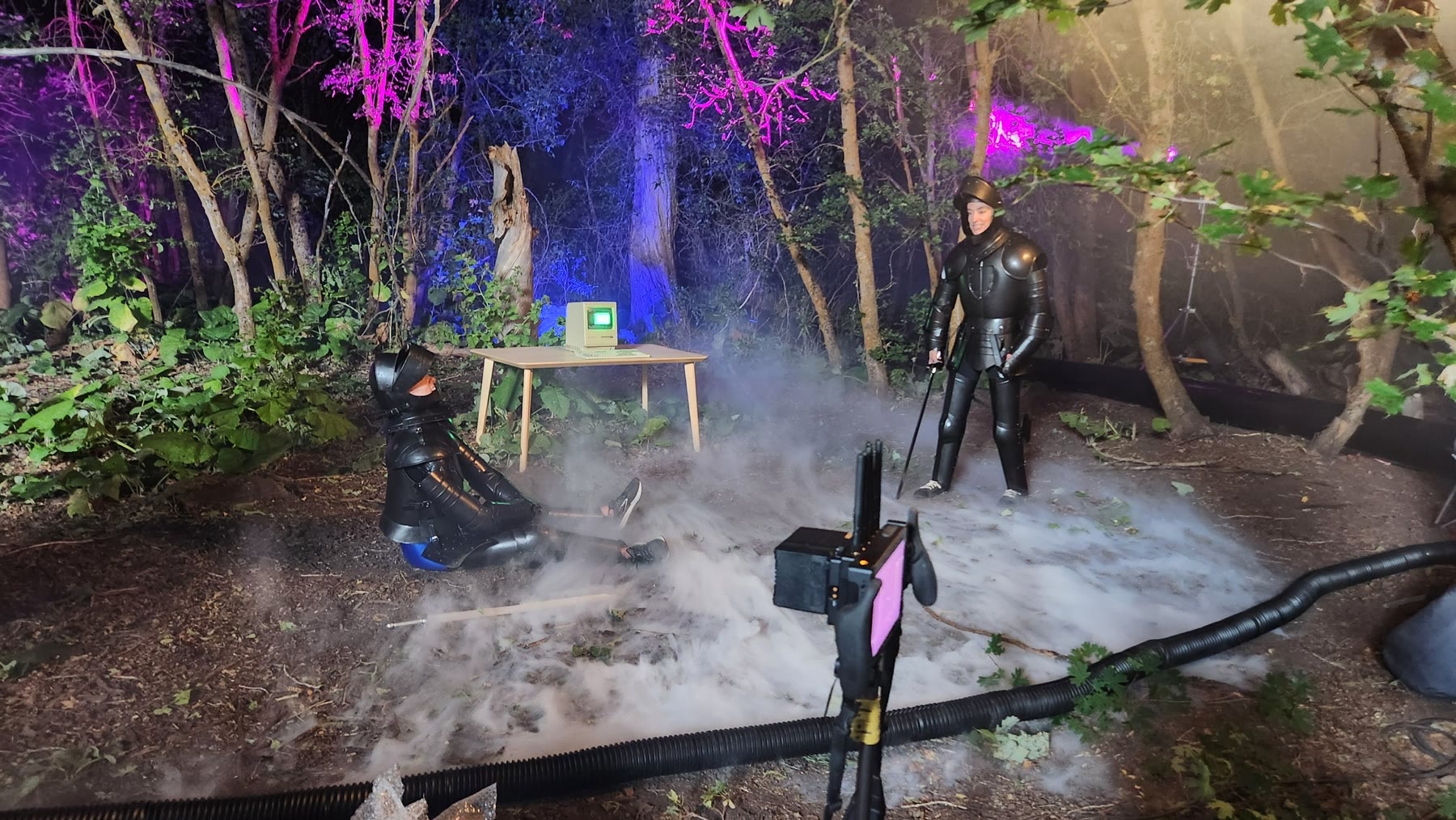 Burt working within the practical fog and lighting setup for The Split.